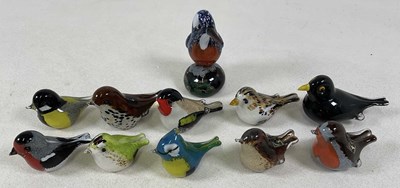 Lot 210 - LANGHAM; eleven crystal glass birds comprising...