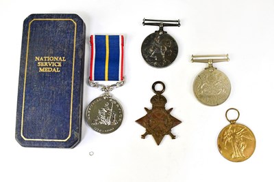 Lot 437 - A group of five medals comprising a 1914-15...