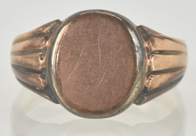 Lot 1190 - A 9ct rose gold signet ring, with blank oval...