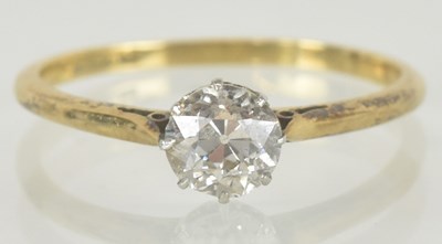 Lot 1161 - An 18ct gold diamond solitaire ring, the cut...