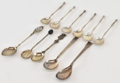 Lot 1081 - A set of six white metal teaspoons, the...