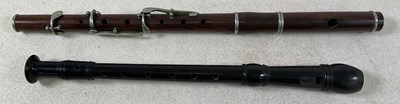 Lot 57 - A rosewood and nickel flute, 40cm, and a...