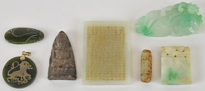 Lot 673 - Seven Chinese carved jade pendants, including...