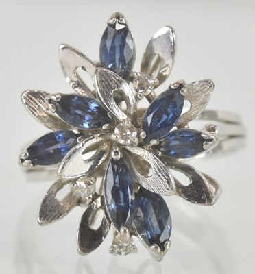 Lot 1187 - A contemporary 18k white gold floral cluster...