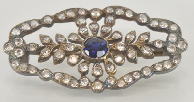 Lot 1289 - An Edwardian open diamond and sapphire set...