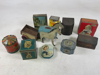 Lot 42 - A quantity of tins, together with a scratch...