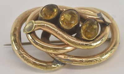 Lot 1283 - A yellow metal citrine set three stone...