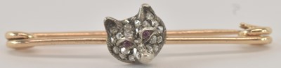 Lot 1286 - A yellow metal bar brooch, with diamond...