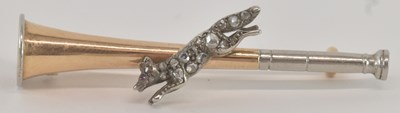 Lot 1282 - A yellow and white metal bar brooch, modelled...