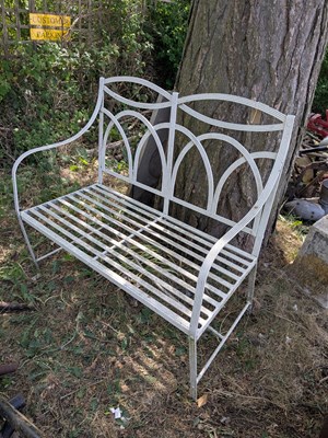 Lot 2335 - A white painted iron bench, width 106cm.