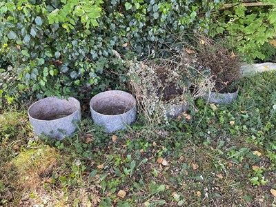 Lot 2331 - A set of four lead circular garden planters,...