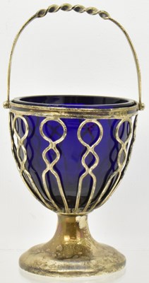 Lot 1125 - An Edwardian hallmarked silver basket, with...