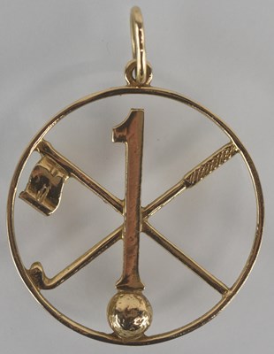 Lot 1228 - GOLFING INTEREST; a 9ct gold circular necklace...
