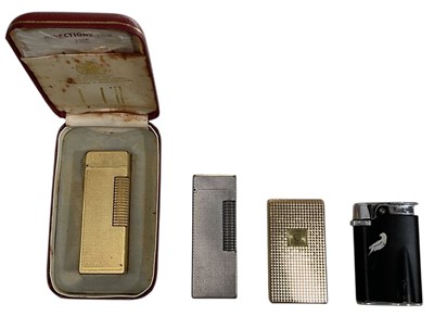 Lot 311 - Four collectable vintage lighters, comprising...