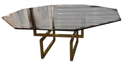 Lot 61 - A 1970s/80s abstract brass framed coffee table,...