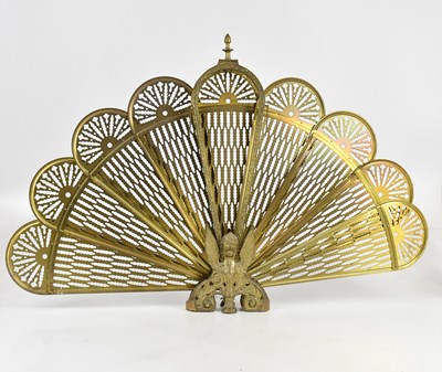 Lot 1389 - An articulated folding brass firescreen,...
