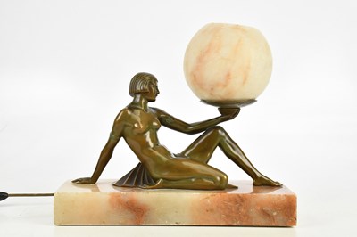 Lot 338 - A 1930s spelter painted table lamp, on marble...