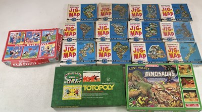 Lot 41 - WADDINGTON'S; twelve shaped continent themed...