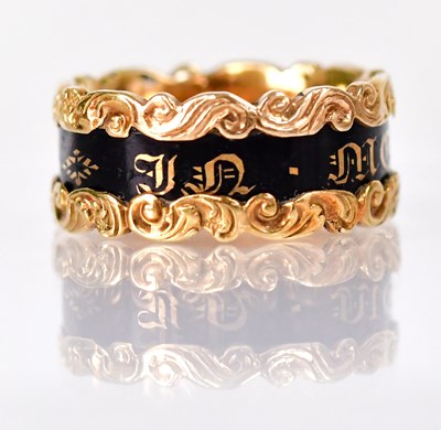 Lot 1012 - An 18ct gold mourning ring with scroll banding...