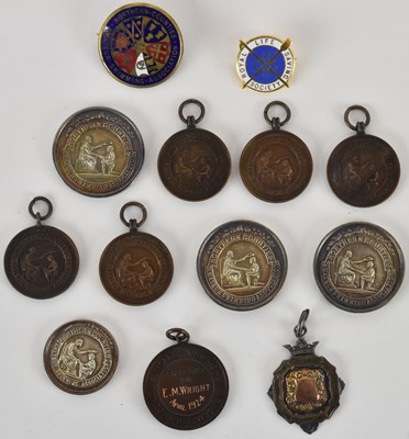 Lot 1122 - A group of various early 20th century swimming...