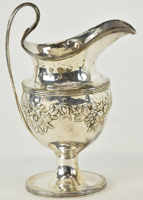 Lot 1123 - A George III hallmarked silver cream jug of...