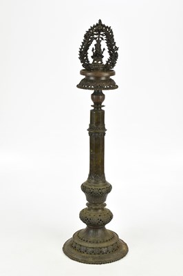 Lot 3 - A Tibetan bronze panas lamp, height 71cm.