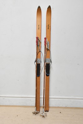 Lot 2493 - A set of wooden skis and poles.