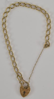 Lot 1311 - A 9ct yellow gold bracelet, with padlock clasp,...
