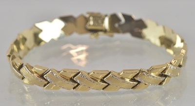 Lot 1306 - A 14ct yellow gold lattice link bracelet,...