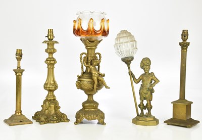 Lot 2413 - A collection of five brass table lamps,...