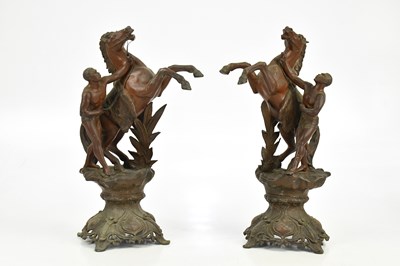 Lot 1422 - A pair of spelter Marly type horses, on...