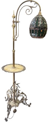 Lot 91 - A late 19th/early 20th century brass framed...