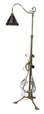 Lot 92 - A late 19th/early 20th century brass framed...