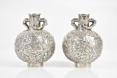 Lot 60 - WANG HING; a pair of Chinese Export silver...