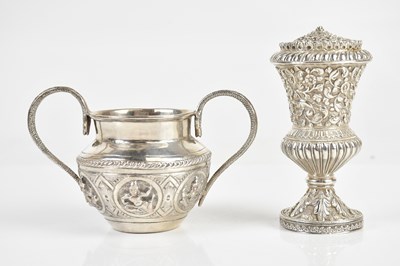 Lot 1529 - An Indian white metal twin handled sugar bowl,...