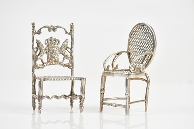 Lot 1541 - A Continental white metal miniature model of a...