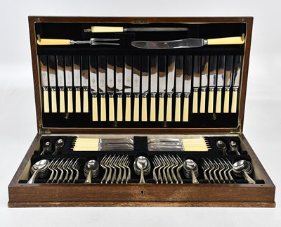 Lot 1432 - VINERS; an oak cased canteen of silver plated...
