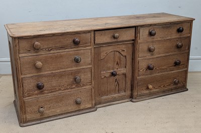 Lot 2254 - A Victorian pitch pine dresser base, with an...