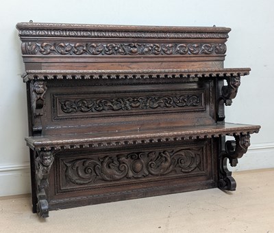 Lot 2257 - An early 19th century carved oak book/display...