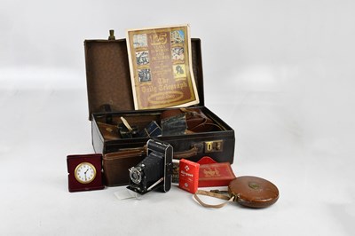 Lot 1315 - A vintage suitcase and assorted collectors'...