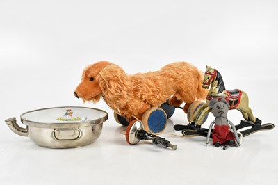 Lot 1324 - TRI-ANG; a vintage clockwork mouse with key, a...