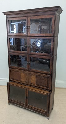 Lot 2150 - A mid 20th century oak five tier bookcase,...
