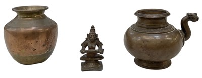 Lot 634 - A small Indian bronze ewer, with figural spout,...
