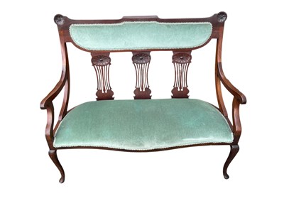 Lot 2147 - An Edwardian carved mahogany settee, with...