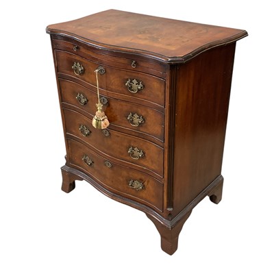 Lot 2149 - MAPLES & CO, LONDON; a walnut serpentine...