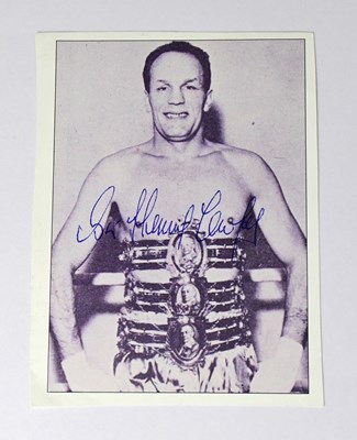 Lot 657 - HENRY COOPER; a cut-out picture from a...