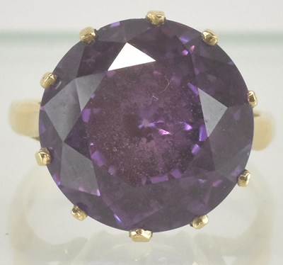 Lot 1193 - A 9ct yellow gold amethyst set dress ring, the...