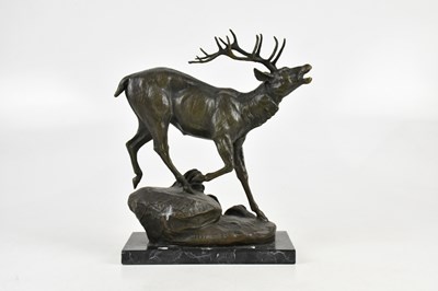 Lot 1409 - AFTER P LECOURTIER; a bronze stag on marble...