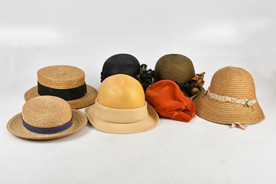 Lot 1693 - A collection of vintage straw hats.