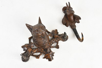 Lot 1263 - BLACK FOREST; two Victorian coat hooks,...